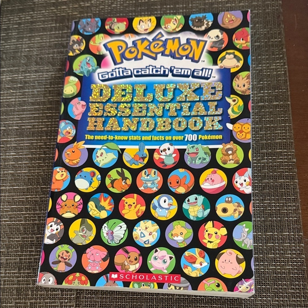 Pokémon Deluxe Essential Handbook The need to know stats and facts. Like new